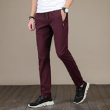 New Men's Casual Pants Autumn Winter Designer Solid Color Plus Size Slim Stretch Pants Men Loose Sweat Pants M~5XL AFK01