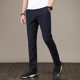 New Men's Casual Pants Autumn Winter Designer Solid Color Plus Size Slim Stretch Pants Men Loose Sweat Pants M~5XL AFK01