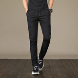 New Men's Casual Pants Autumn Winter Designer Solid Color Plus Size Slim Stretch Pants Men Loose Sweat Pants M~5XL AFK01